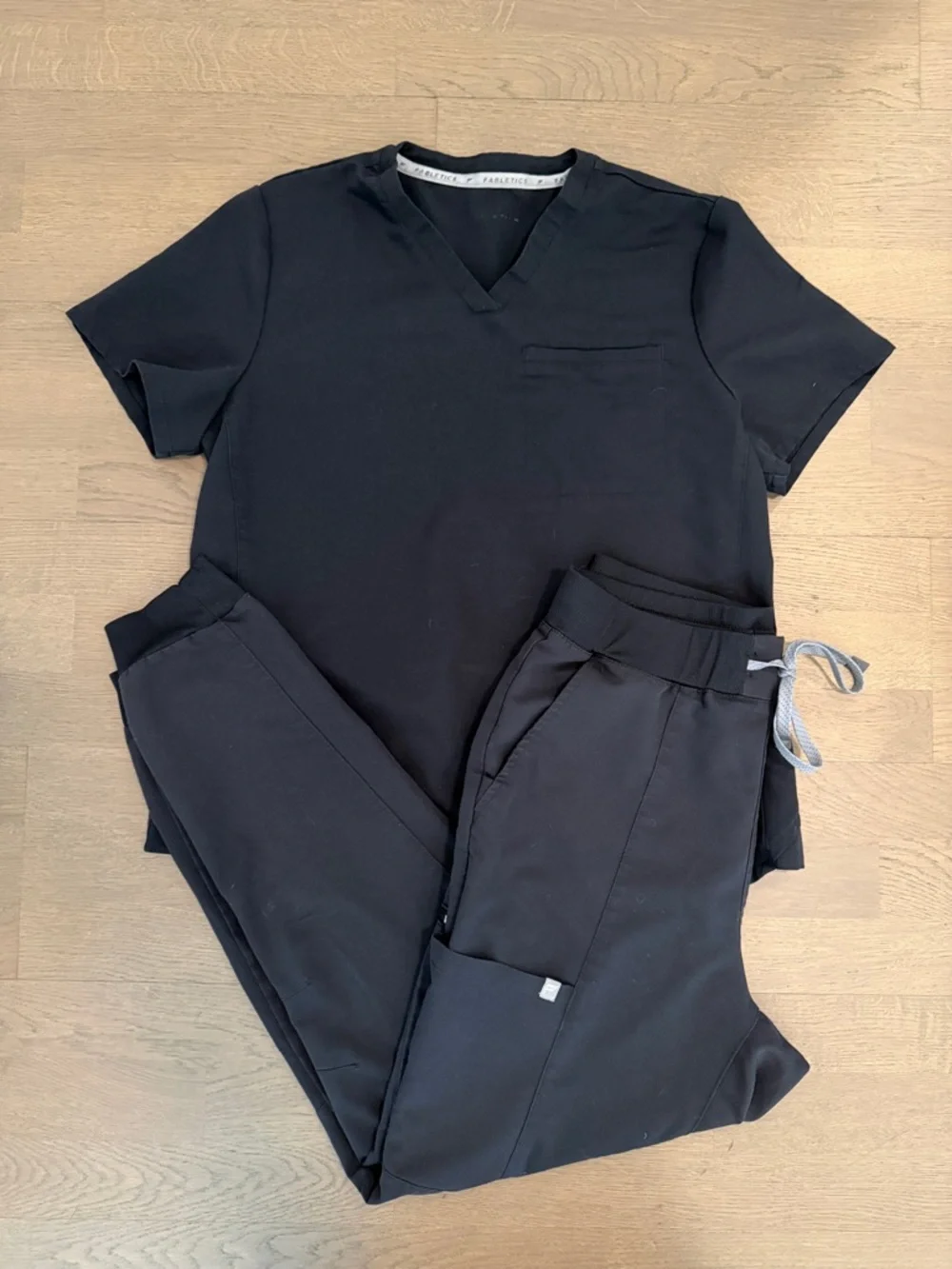 Fabletics Vital Scrub Top in Black - Picture 7 of 7